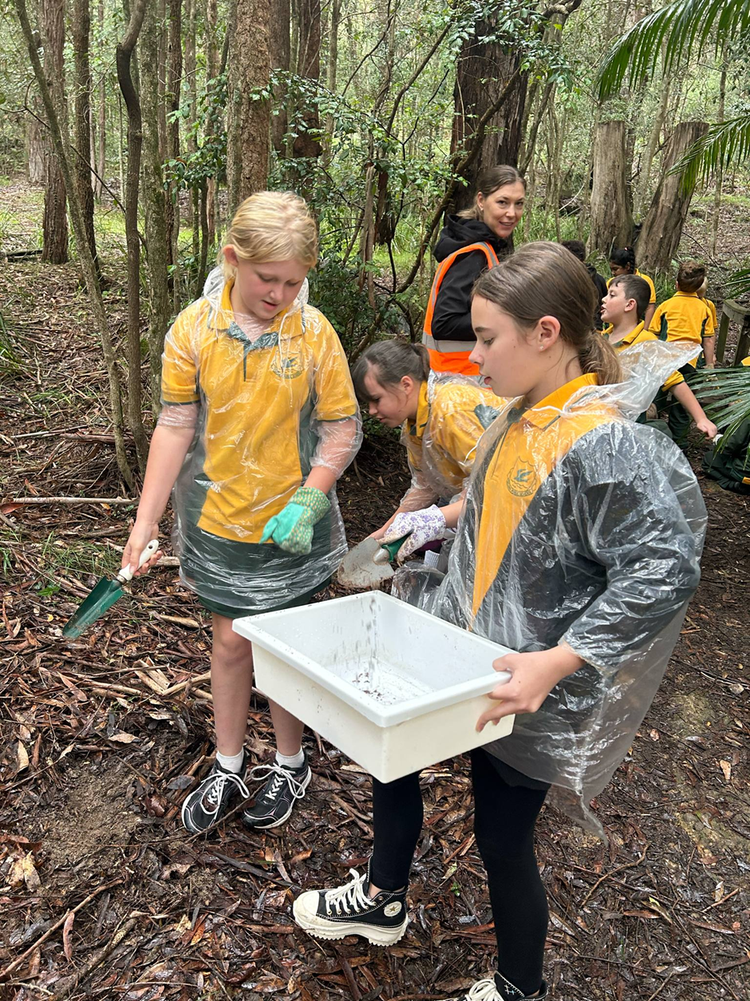 A group of students on excursion in the bush.
