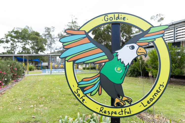 The Goldie school symbol on a sign.